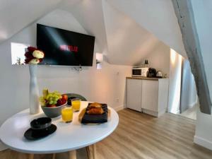 Η κουζίνα ή μικρή κουζίνα στο Mon Saint-Malo - APPART'HOTEL - Coeur de Bayeux