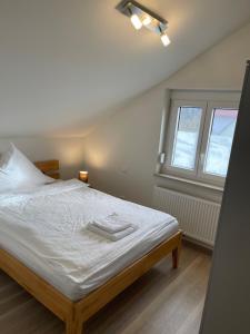 Postel nebo postele na pokoji v ubytování Ferienwohnung MaRe