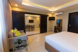 Iloilo Gateway Hotel and Suites客房内的一张或多张床位