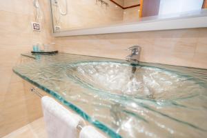 Koupelna v ubytování Hotel Blaucel