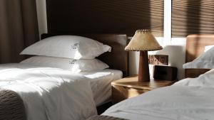 Postel nebo postele na pokoji v ubytování Dingdaer Pool B&B