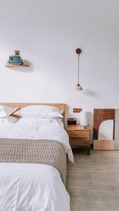 Postel nebo postele na pokoji v ubytování Dingdaer Pool B&B