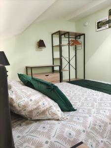 Postel nebo postele na pokoji v ubytování Gîte de la Lorada