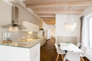 Η κουζίνα ή μικρή κουζίνα στο Sailorlodge - Versteck am Strom +10 φωτογραφίες