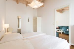 Ένα ή περισσότερα κρεβάτια σε δωμάτιο στο Sailorlodge - Versteck am Strom