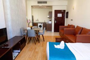 พื้นที่นั่งเล่นของ Palm Inn Hotel Doha