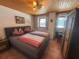 Postel nebo postele na pokoji v ubytování Haus Nelsen