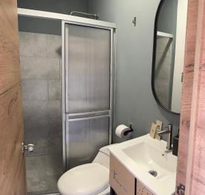 Kopalnica v nastanitvi Nomadia Coliving Boutique