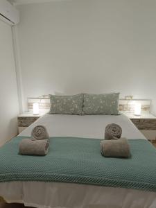 A bed or beds in a room at Vera Natura Apartamento Iker Még 37 kép