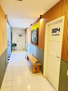 TV in/ali zabaviščno središče v nastanitvi Nomadia Coliving Boutique