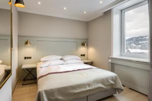 Posteľ alebo postele v izbe v ubytovaní Krupówki 17 Resort & SPA