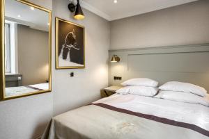 Posteľ alebo postele v izbe v ubytovaní Krupówki 17 Resort & SPA