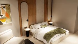 Alizo Comfort Chic Stay Rhodes - Adults Only tesisinde bir odada yatak veya yataklar