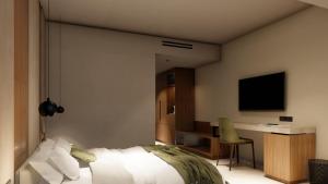 Alizo Comfort Chic Stay Rhodes - Adults Only tesisinde bir odada yatak veya yataklar