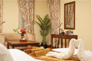 Posezení v ubytování Faletti's Grand Hotel Gujranwala