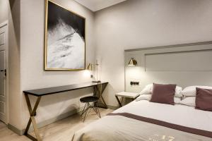 Posteľ alebo postele v izbe v ubytovaní Krupówki 17 Resort & SPA