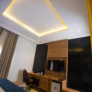 TV a/nebo společenská místnost v ubytování Prosbel Hotel