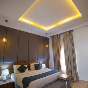 Postel nebo postele na pokoji v ubytování Prosbel Hotel