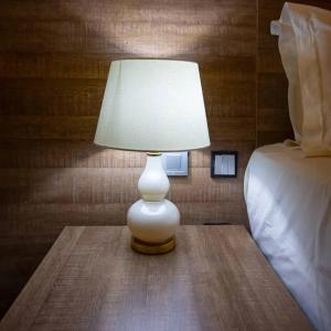 Postel nebo postele na pokoji v ubytování Prosbel Hotel