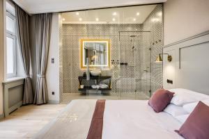 Posteľ alebo postele v izbe v ubytovaní Krupówki 17 Resort & SPA