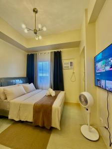 Ένα ή περισσότερα κρεβάτια σε δωμάτιο στο 20F Cozy Studio Unit at Avida Aspira Tower 1 +38 φωτογραφίες