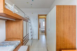 Ένα ή περισσότερα κρεβάτια σε δωμάτιο στο Casa Raffaele