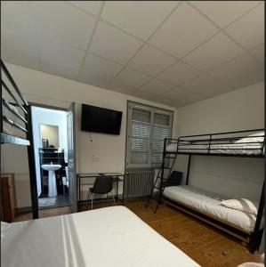 Voodi või voodid majutusasutuse Hotel Relais Sud toas