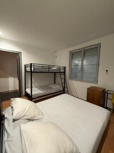 Voodi või voodid majutusasutuse Hotel Relais Sud toas