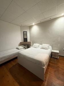 Voodi või voodid majutusasutuse Hotel Relais Sud toas