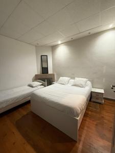 Voodi või voodid majutusasutuse Hotel Relais Sud toas