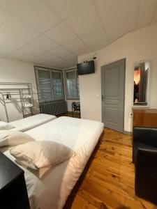 Voodi või voodid majutusasutuse Hotel Relais Sud toas