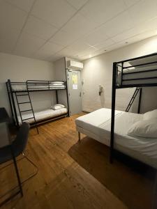 Voodi või voodid majutusasutuse Hotel Relais Sud toas