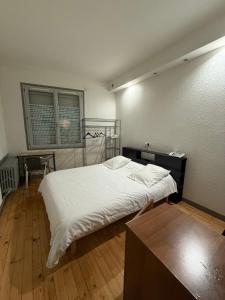 Voodi või voodid majutusasutuse Hotel Relais Sud toas