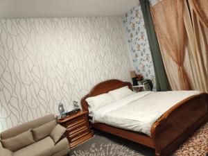 Postel nebo postele na pokoji v ubytování FARISTHA house