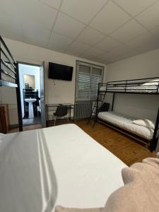 Voodi või voodid majutusasutuse Hotel Relais Sud toas
