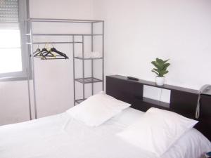 Voodi või voodid majutusasutuse Hotel Relais Sud toas