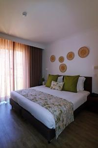 Кровать или кровати в номере Hotel Euro Moniz