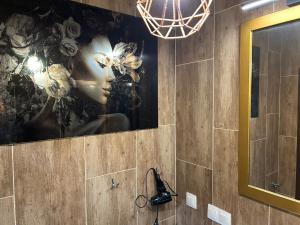 Kúpeľňa v ubytovaní GoldenEye Apartment Center + 26 fotografií