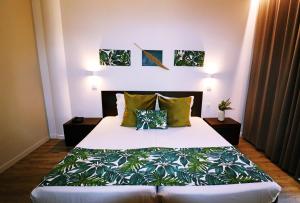 Кровать или кровати в номере Hotel Euro Moniz