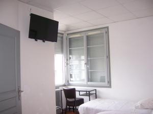 TV a/nebo společenská místnost v ubytování Hotel Relais Sud