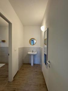 Koupelna v ubytování Albergo Tenco by Bottega + 37 fotografií