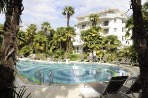 Bazén v ubytovaní Parc Hotel Flora S alebo v jeho blízkosti