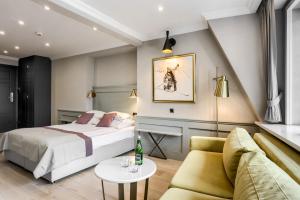 Posteľ alebo postele v izbe v ubytovaní Krupówki 17 Resort & SPA