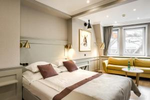 Posteľ alebo postele v izbe v ubytovaní Krupówki 17 Resort & SPA