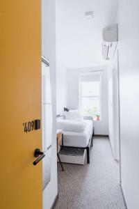 Postel nebo postele na pokoji v ubytování Hotel Hive