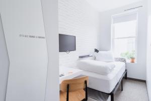 Postel nebo postele na pokoji v ubytování Hotel Hive