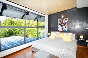 Postel nebo postele na pokoji v ubytování Villa Antema + 37 fotografií