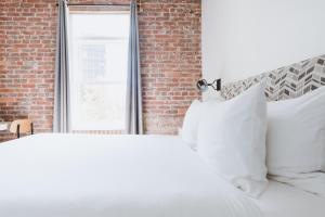 Postel nebo postele na pokoji v ubytování Hotel Hive