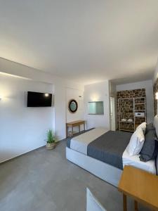 Postel nebo postele na pokoji v ubytování Trocadero Luxury Suites