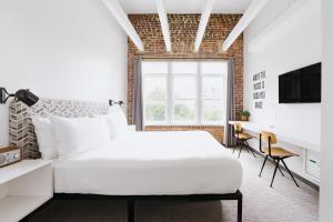 Postel nebo postele na pokoji v ubytování Hotel Hive
